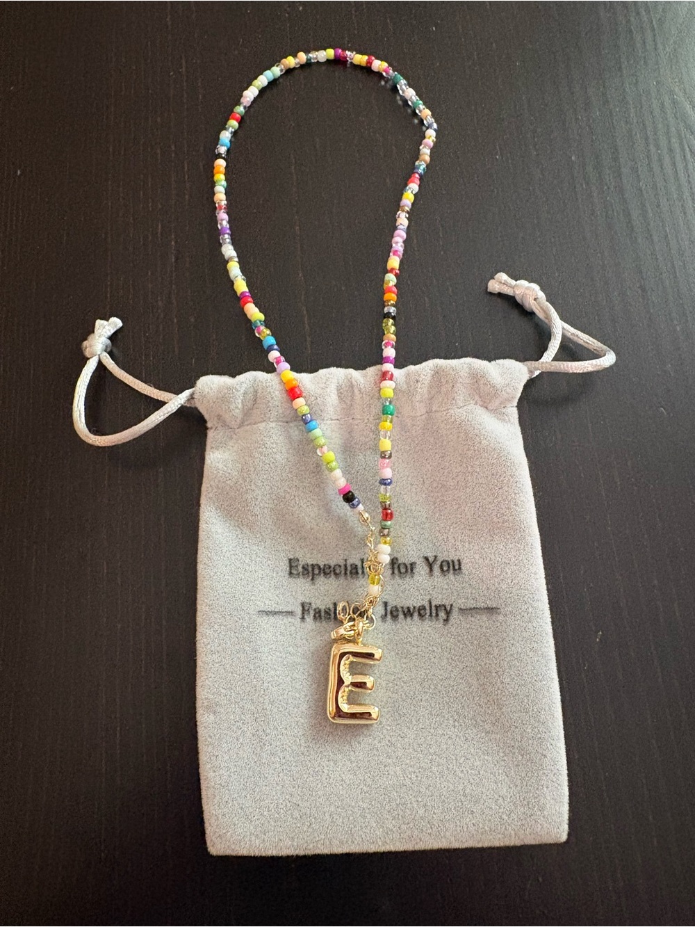 Multicolor Beaded Necklace with Gold 'E' Initial Charm